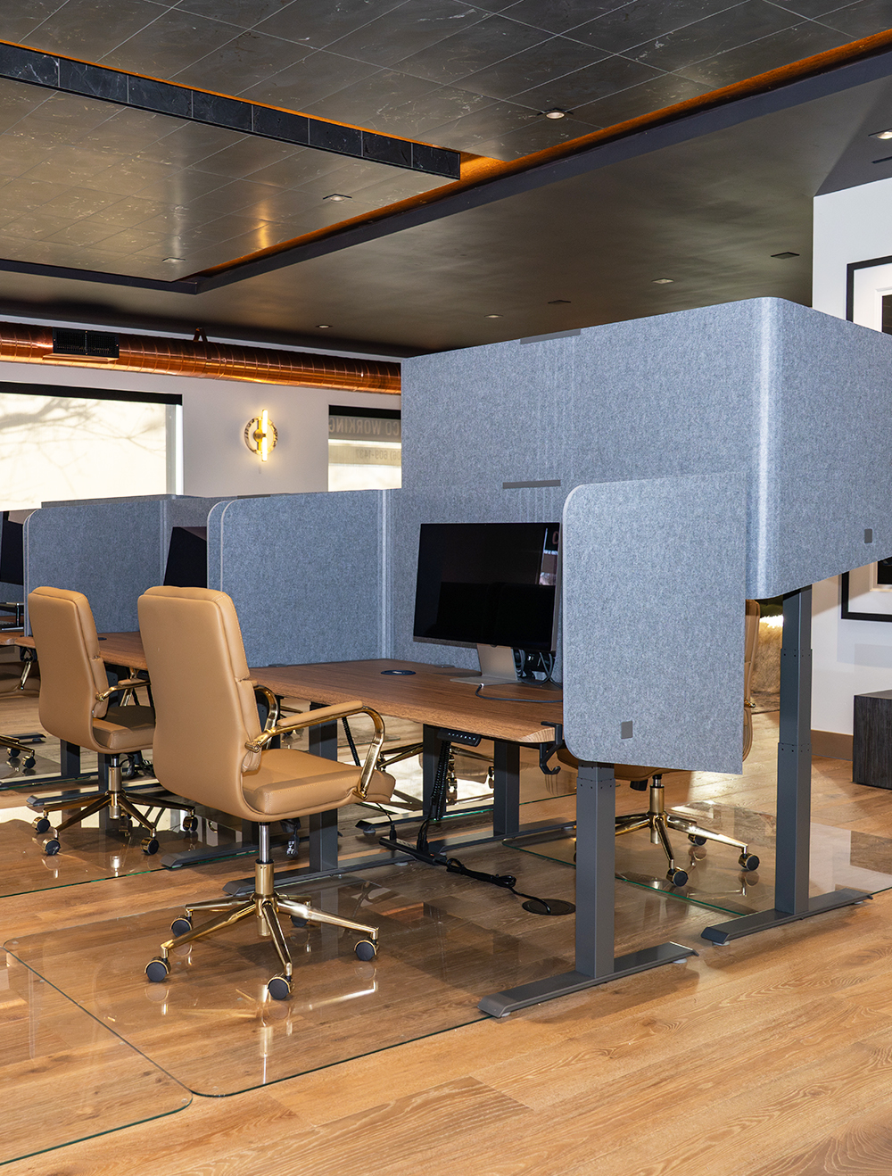 Dedicated desk in open workspace at Central Collective